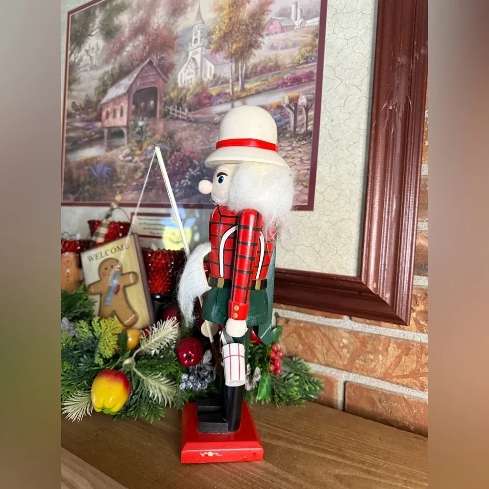 Vintage 1984 Solid Wood Hand Carved Nut Cracker going fishing Home Decor